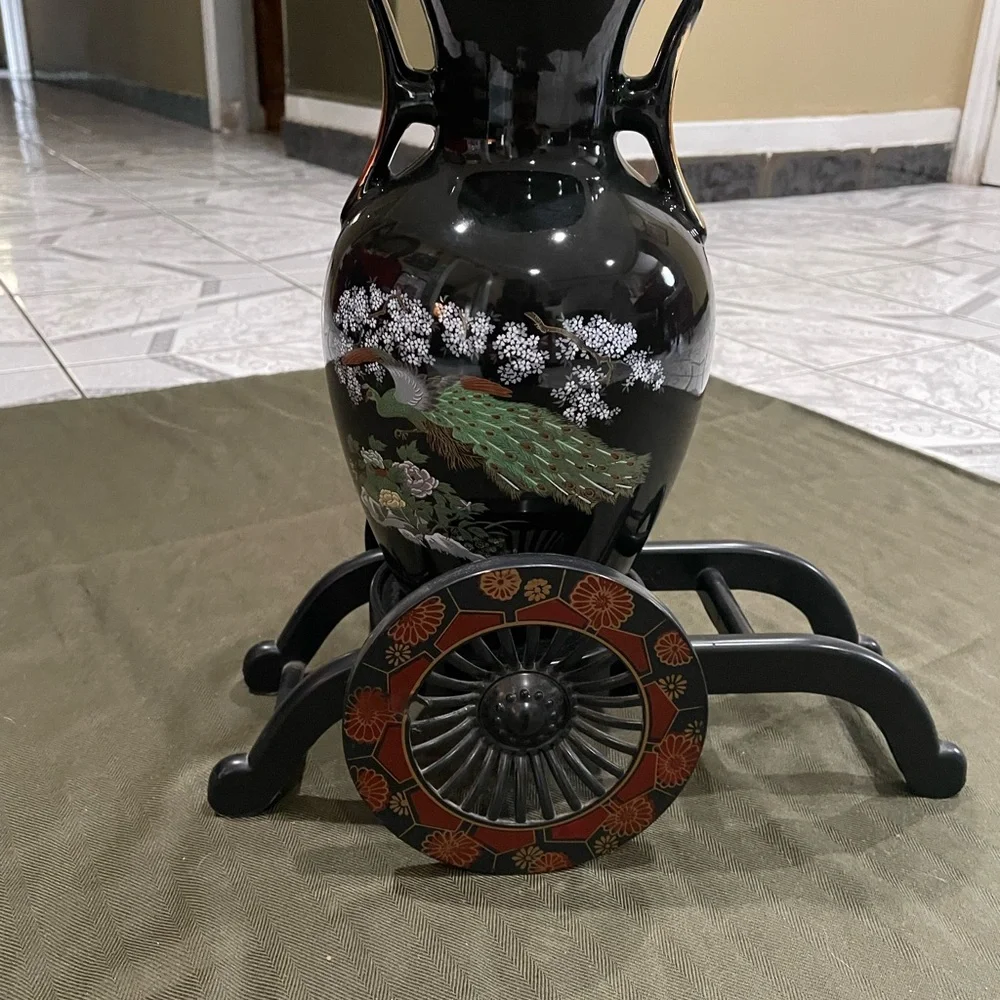 Elegant Black Floral Vase with Stand the card has a broken bar but it doesn’t